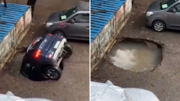 太恐怖！印度汽車停路邊遭水坑「吞沒」，車頭朝下栽入十幾秒後徹底消失…